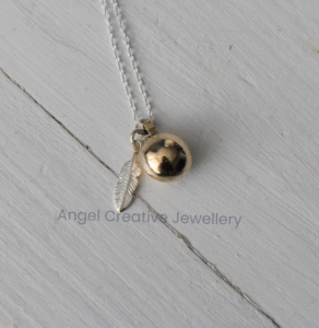Gold Orb with Feather